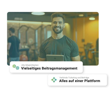 Mann mit Tablet lacht in die Kamera